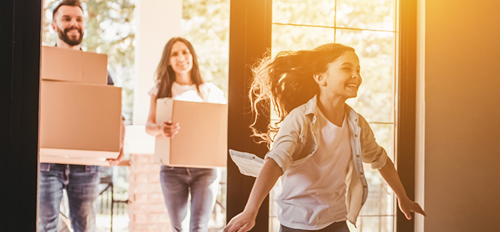 Family entering in the house